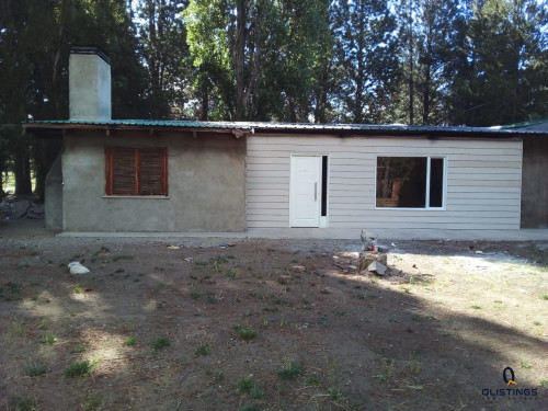 Qlistings Patagonian Ranch Facing the Historic Steam Train “La Trochita” – 5 Hectares with Renovated House image 1